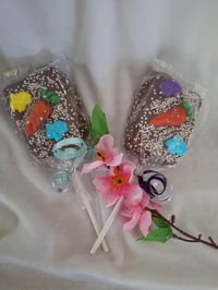 Image 1 of Chocolate dipped rice crispies, available in seasonal variations 