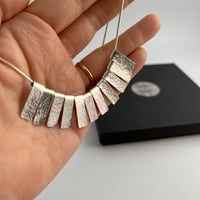 Hammered 11 strip necklace