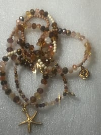 Image 5 of Brownie Cream Bracelet w/charms