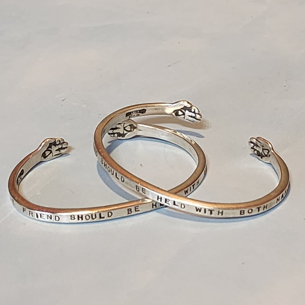 Image of "A True Friend should be held with Both Hands