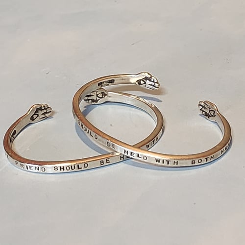 Image of "A True Friend should be held with Both Hands