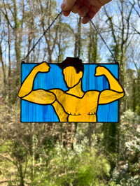 Image 1 of Flexing Dude - Amber