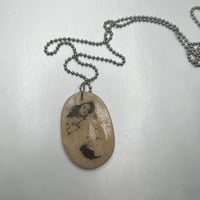 Image 1 of laid