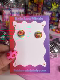 Trippy neon smiley studs