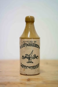 Image 1 of Antique Stoneware bottle - W.C.D Doherty LTD Londonderry