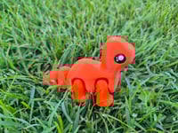 Image 1 of Orange Mini Brachiosaurus