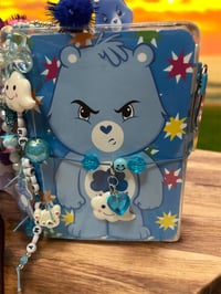Image 1 of Grumpy Care Bear TN Travelers/Planner Notebook & Bracelet