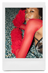 Image 1 of SANTANA, in red