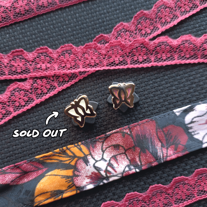 Image of Polarising Variant Mini Butterfly Enamel Pins
