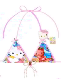 Image 3 of tanned hellokitty in the beach ball game
