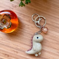 Image 3 of Chibi Iridescent Dinosaur Keychain