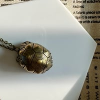 Image 2 of Bronze Ringing Turtle Shell | Necklace