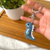 Image 4 of Chibi Iridescent Dinosaur Keychain