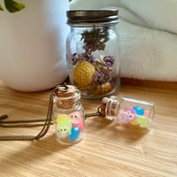 Image 1 of Rainbow Soot Sprites in a Jar