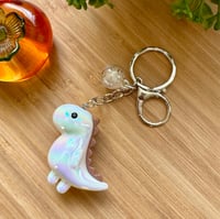 Image 7 of Chibi Iridescent Dinosaur Keychain