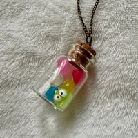 Image 4 of Rainbow Soot Sprites in a Jar