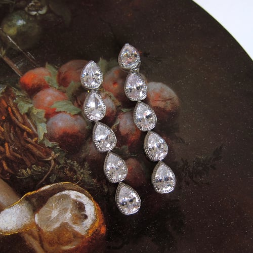 Image of Frostpetal clip-on dangle earrings