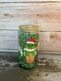 Image 1 of 16oz Grinch Holiday with Green glitter Glass Snow Globe Tumbler