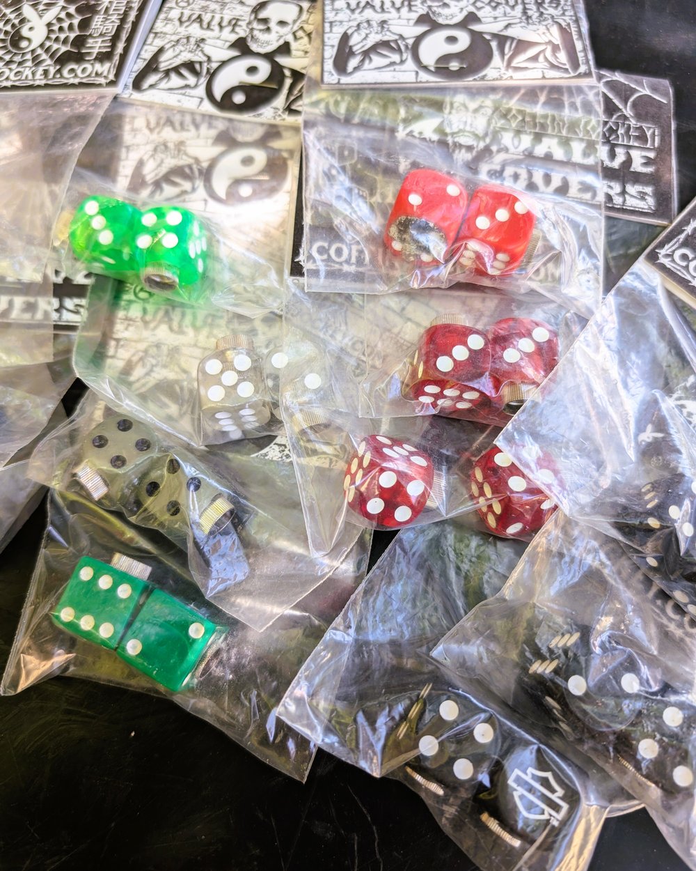 Dice tire valve covers