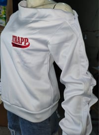 White and red itrapp sweat shirt.