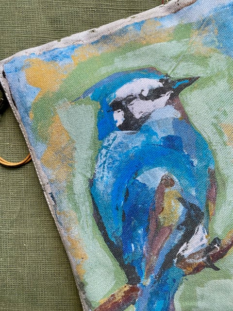 Image of blue birds pouch