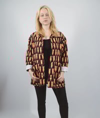 Image 1 of SOBRECAMISA LLAMA LLAMA NEGRO