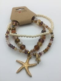 Image 1 of Brownie Cream Bracelet w/charms