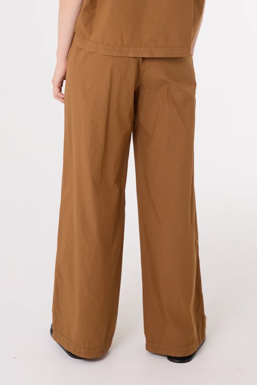 Image of 2-Pantalón Jean color tabaco