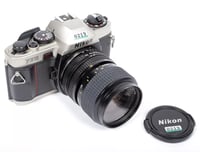Image 1 of Nikon FE10 35mm SLR film camera + Zoom NIKKOR 35-70mm lens TESTED #0219