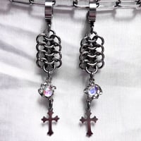 . : + iridescent cross earrings + : .