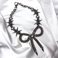 . : + spiked bow necklace + : .