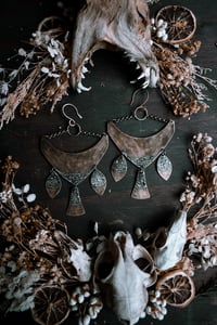 Image 1 of Focused Energy brass and silver ear hangers