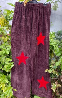 Image 1 of Brown chenille pants with red stars