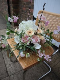 Image 1 of pastel peach floral arrangements 