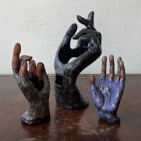 Image 1 of sculpted hands