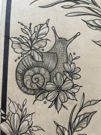 Image 1 of botanical snail