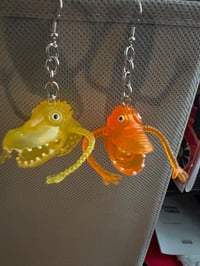 monster finger puppet mismatched earrings
