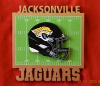 Image 1 of Jacksonville Jaguars Hand Crafted NFL 3D Wooden Team Helmet Wall Décor Hanging Artwork.