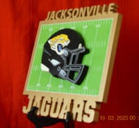 Image 2 of Jacksonville Jaguars Hand Crafted NFL 3D Wooden Team Helmet Wall Décor Hanging Artwork.