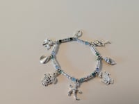 Handmade Ocean-Inspired Beaded Bracelets - Charm & Gemstone Designs