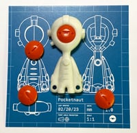 Image 1 of Glow-In-The-Dark Pocketnaut - Orange Faces!