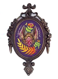 Image 1 of Vampy in oval frame