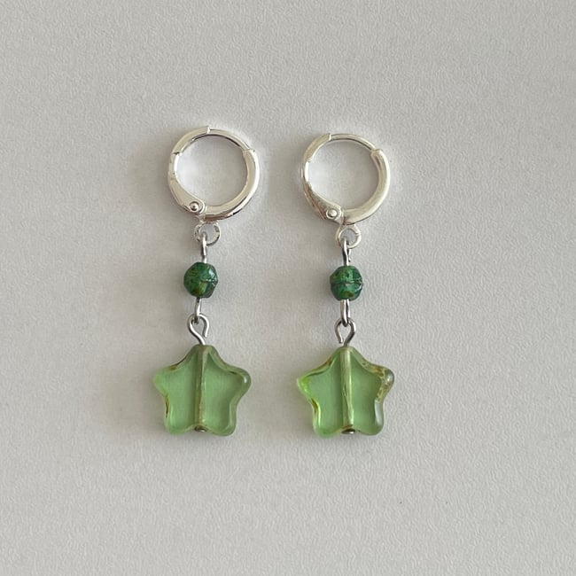 'studded green glass stars' huggie hoop earrings