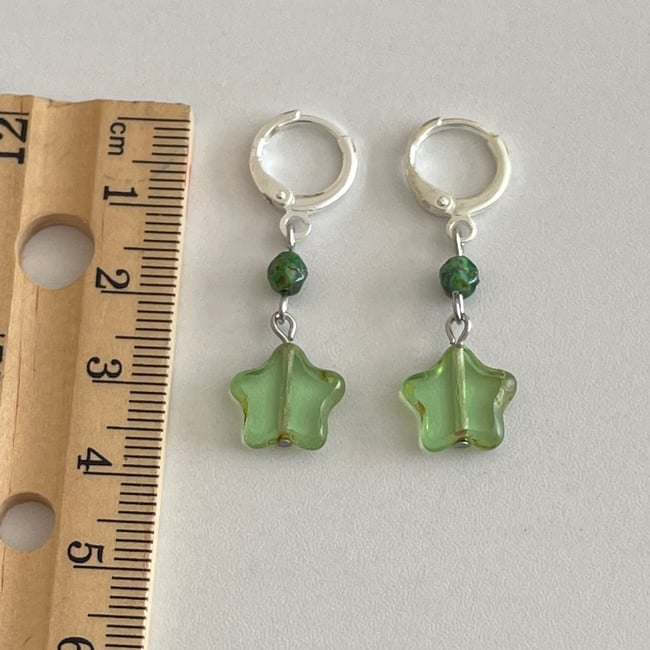 'studded green glass stars' huggie hoop earrings
