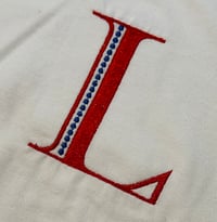 Image 2 of Whtie Baby Romper with Blue and Red "L"