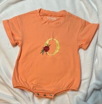 Image 2 of Coral Baby Romper with Rose Flower and Yellow “O”