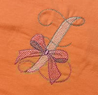 Image 1 of Coral Baby Romper with Pink Bow and White and Gray “Z”
