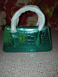 Image 1 of Womens green pocketbook 
