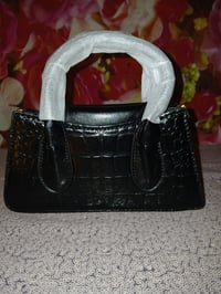 Image 1 of Womens black pocketbook 