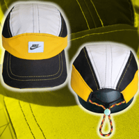 Image 1 of White/Yellow NIKE Tailwind hat 